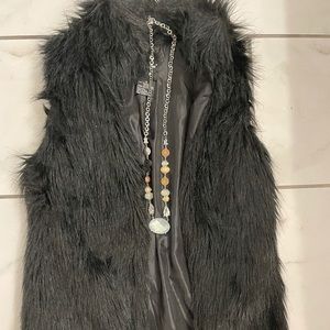 Black faux fur vest